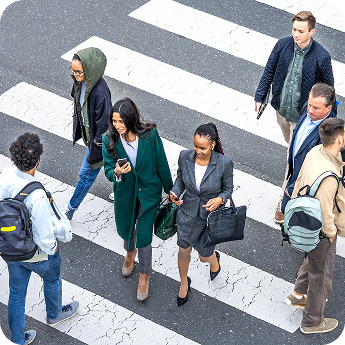 Businesspeople walking across a street